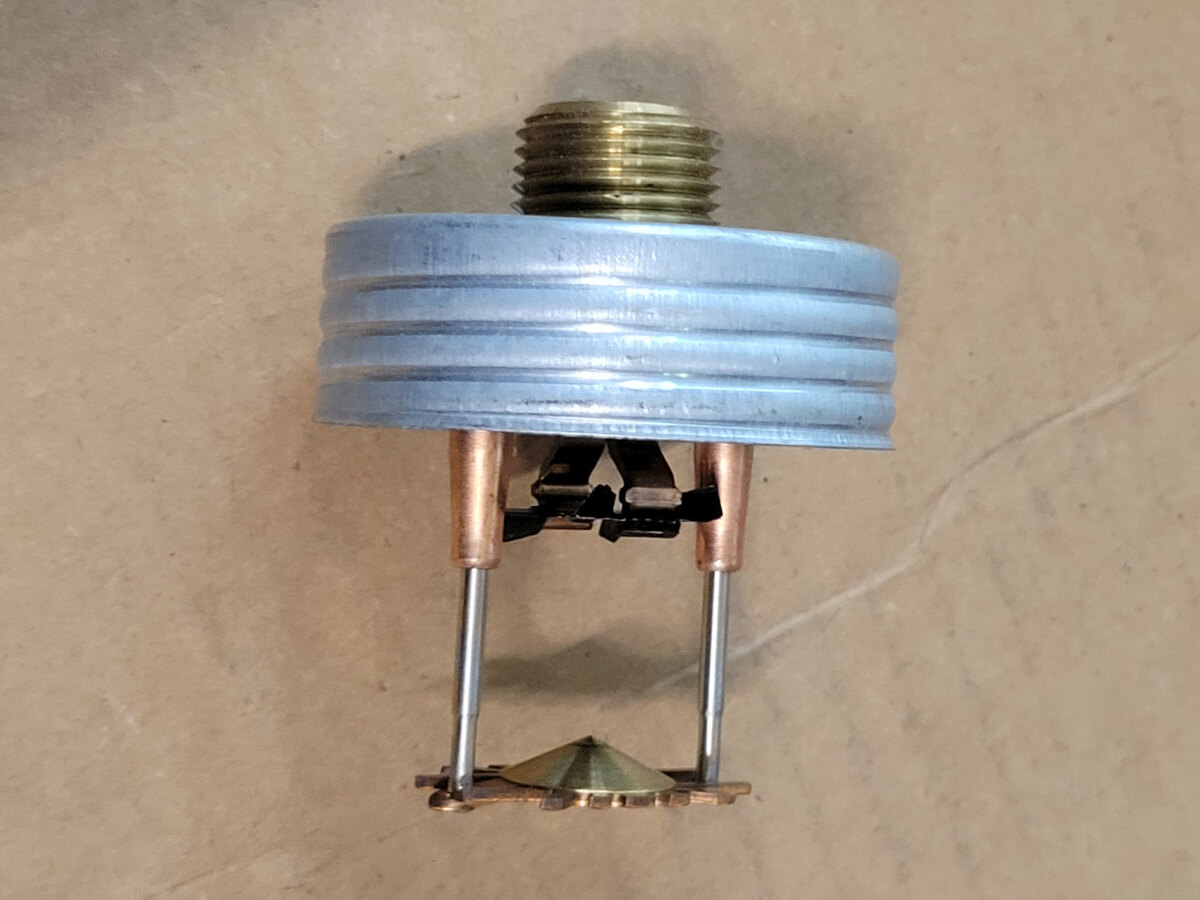 Reliable RFC series concealed residential sprinkler head behind the cover plate